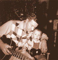 Ron Perry and his Dad with guitars